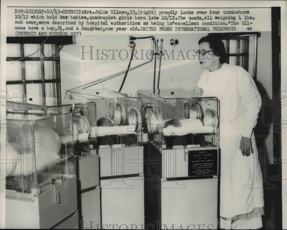 1958 Press Photo Mrs Julia Ullman, looks over four incubators of her quadruplets