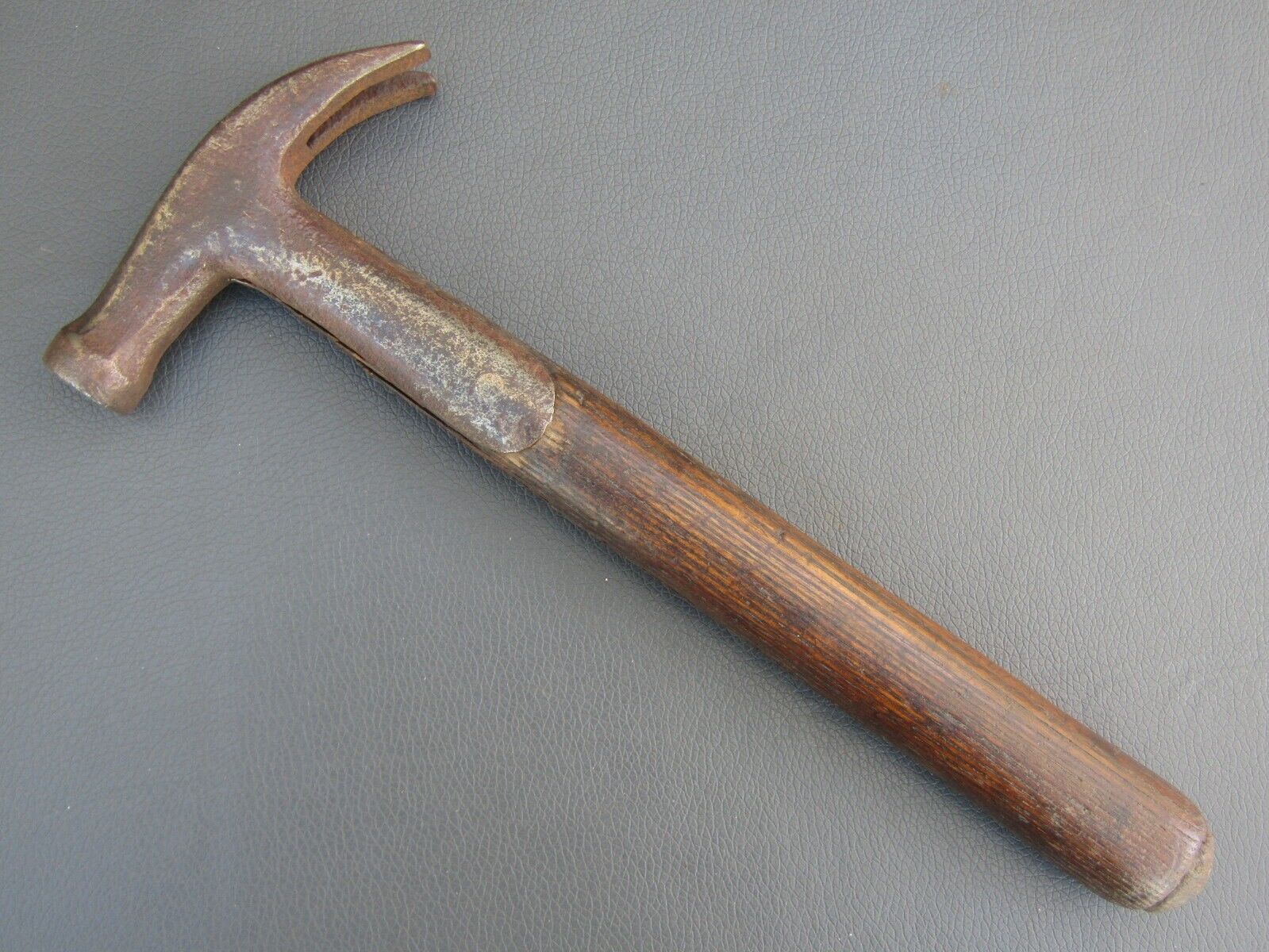 Vintage early strapped claw hammer old tool