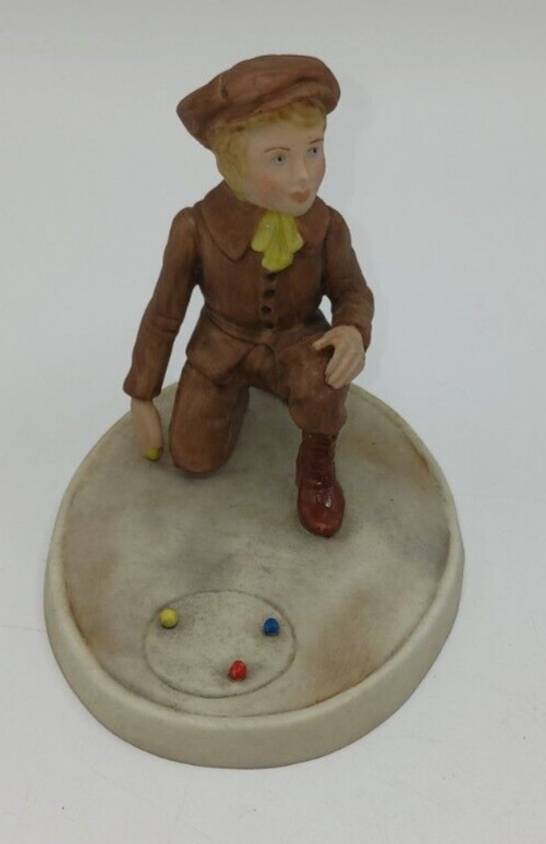 Wedgwood Porcelain Figure of Boy Playing Marbles