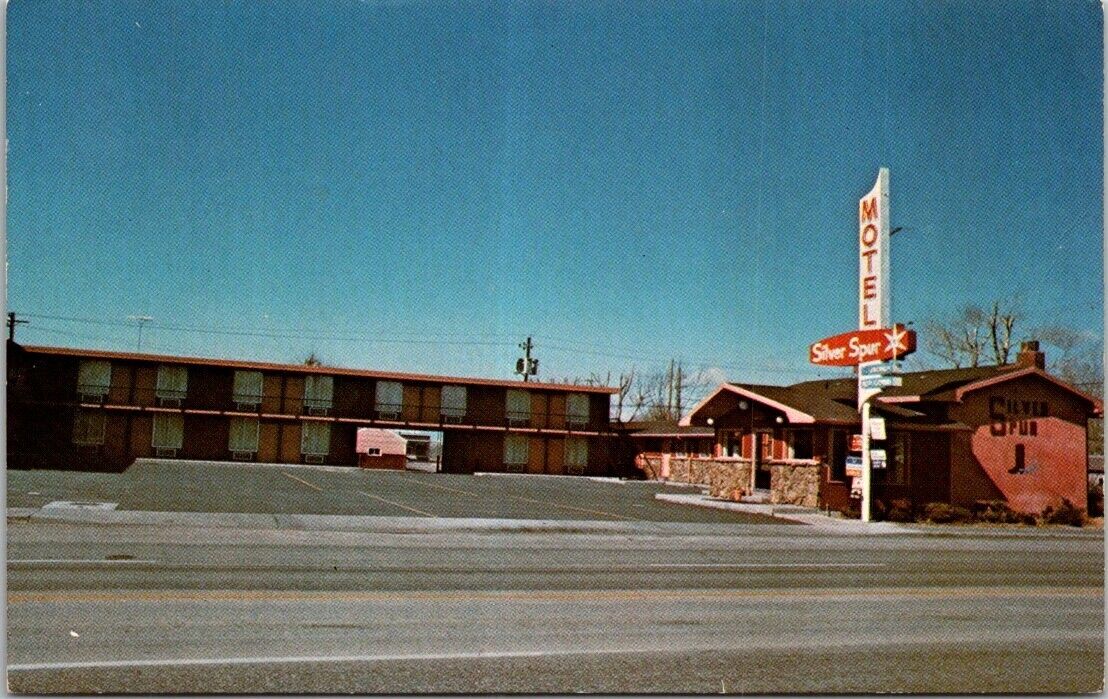 Laramie WY Motel Silver Spur Morgan & Virginia Rasnake Owners Vintage Postcard