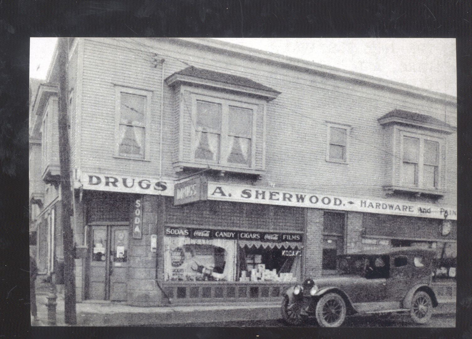 REAL PHOTO SOLVAY NEW YORK NY DOWNTOWN DRUG STORE OLD CAR POSTCARD COPY