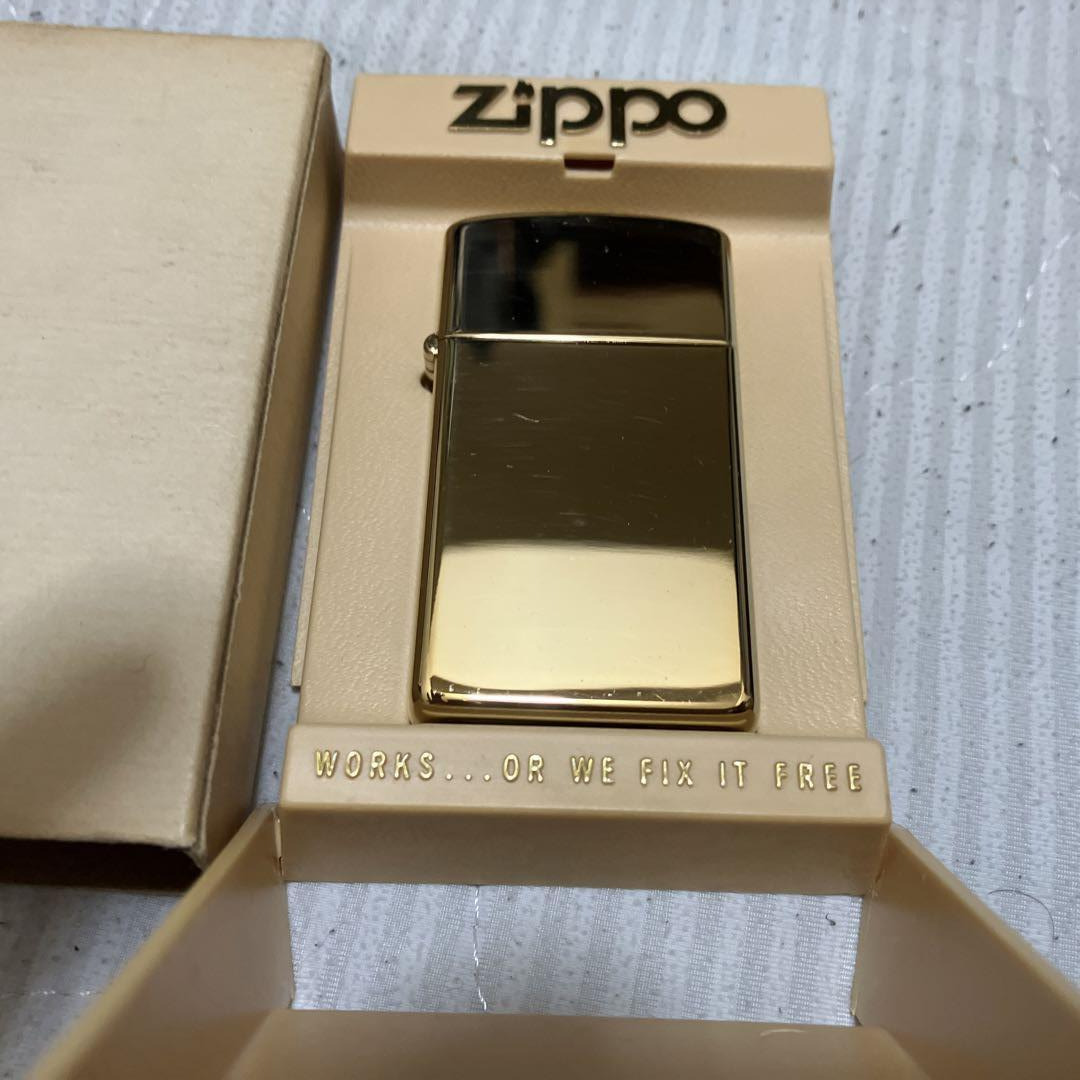 ZIPPO Lighter Gold Slim 1982 Vintage White case Gold ZIPPO Lighter Gold Slim