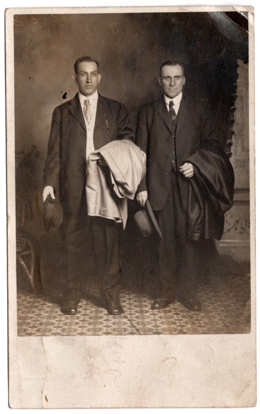 RPPC POSTCARD 1912 TWO HANDSOME YOUNG MEN HOLDING OVERCOATS POSTED