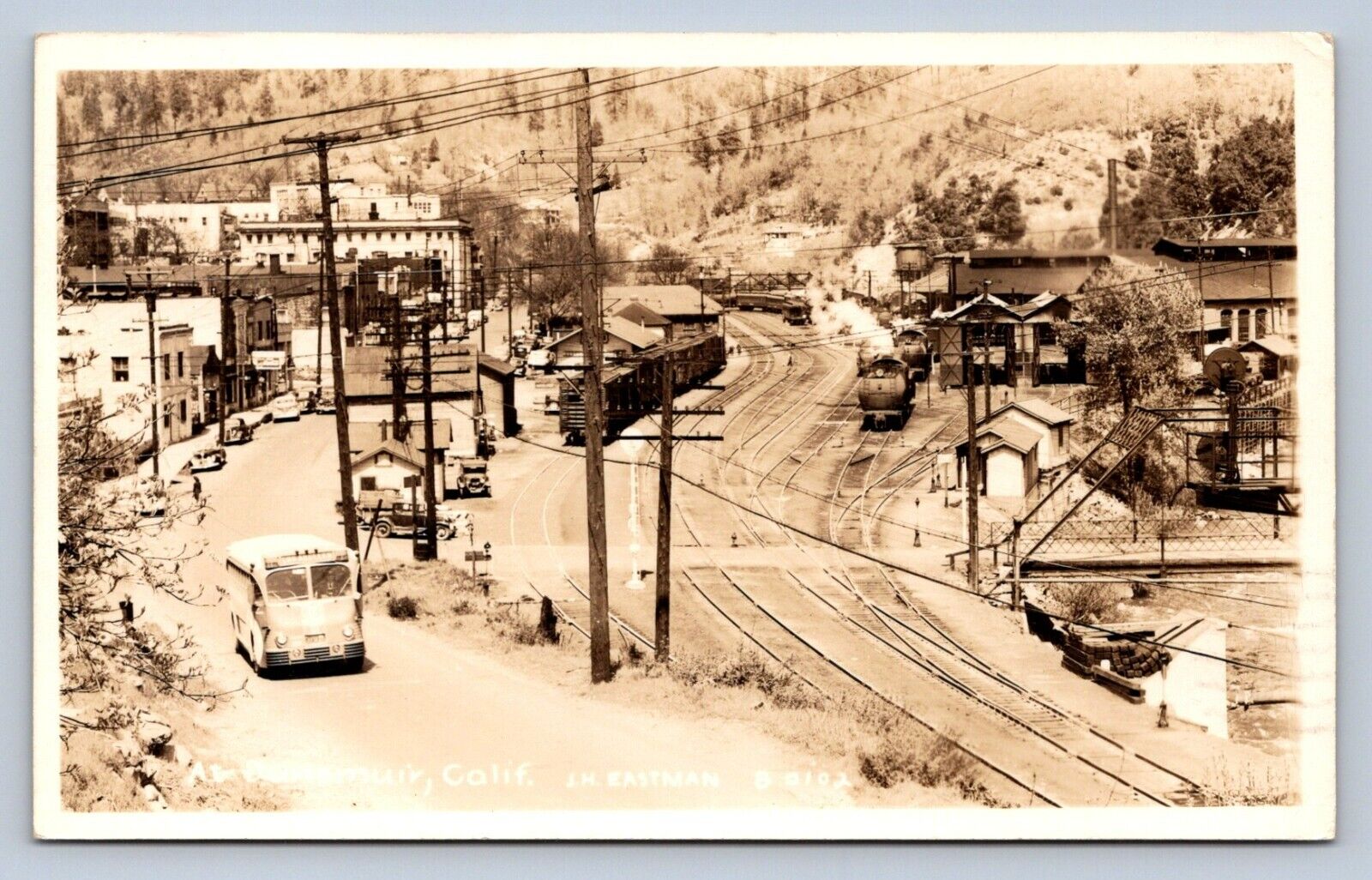 JH2/ Dunsmuir California Postcard RPPC 1944 Bus Stores Railroad Depot 100