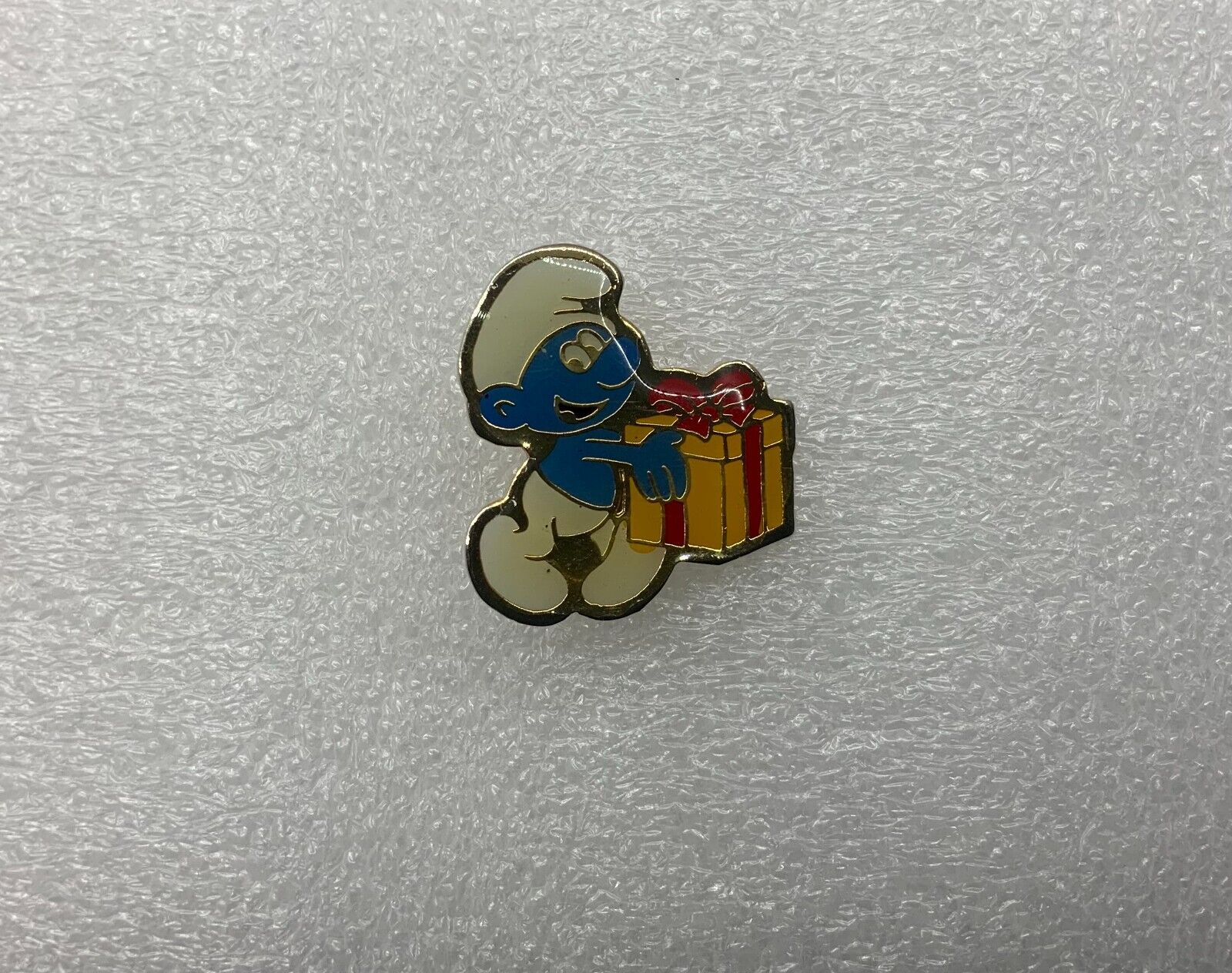 Smurf Brooch Pin , carrying a gift