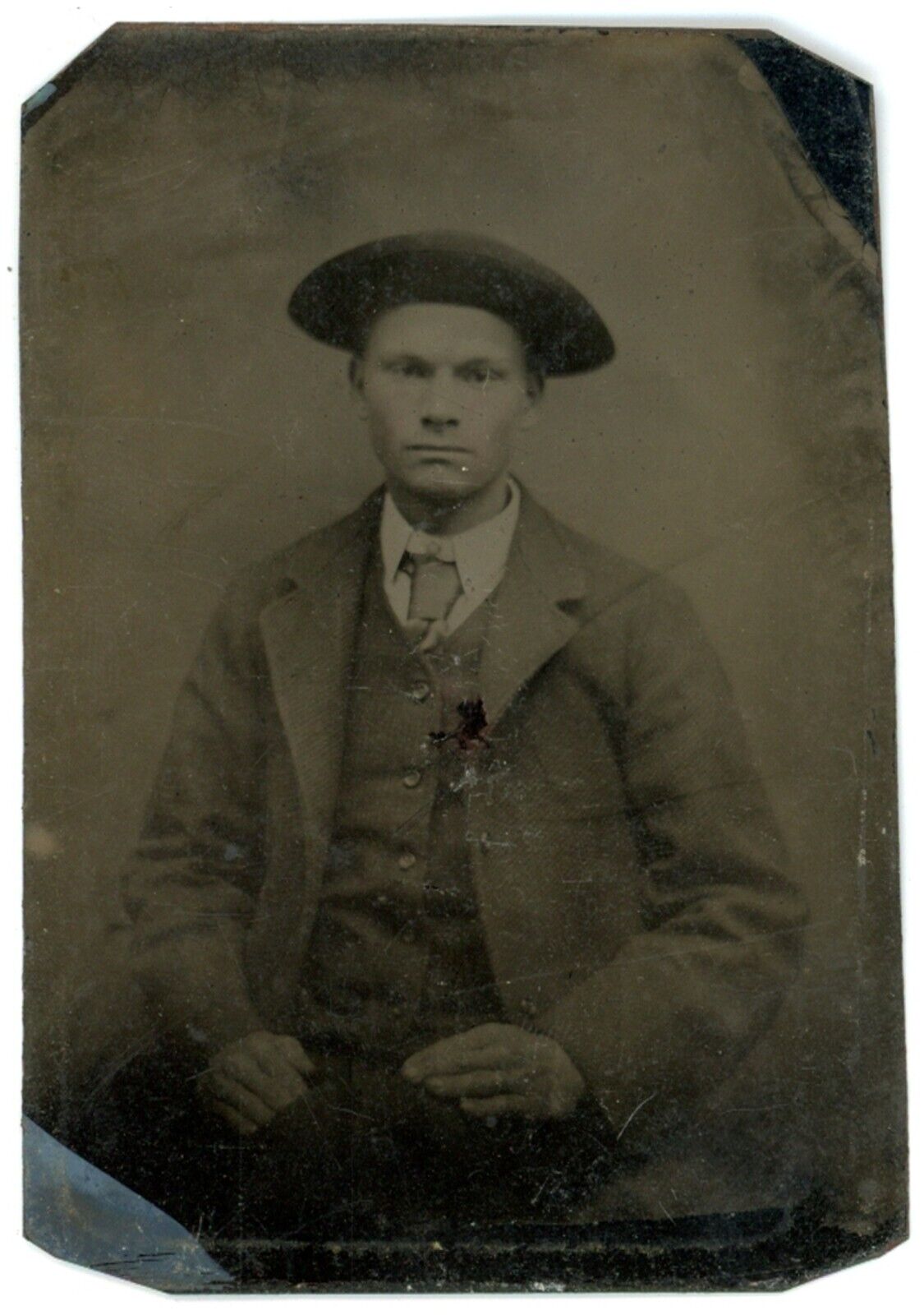 CIRCA 1860'S 2.25X3.13 1/6 Plate Hand Tinted TINTYPE Handsome Young Man in Hat