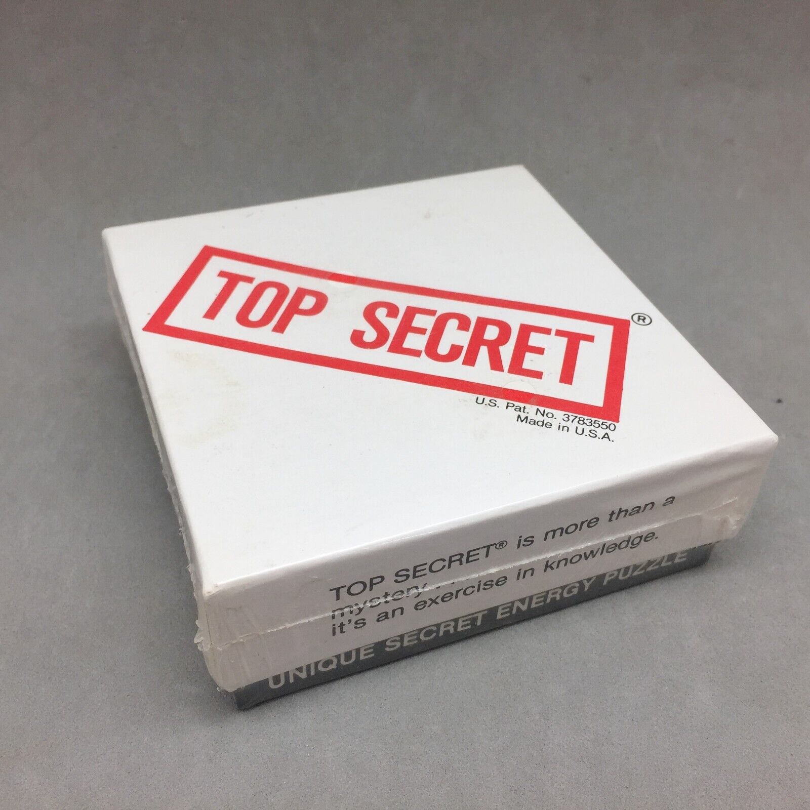 Top Secret Energy Puzzle Perpetual Motion Novelty Spinning Top Andrews Sealed
