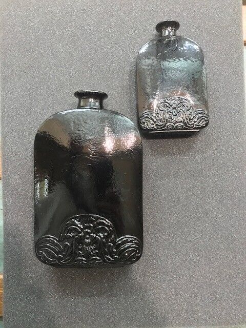 2 Unique Black Glass Mold Blown Flasks w/Scrolling On Bases, 1 Large/1 Small.