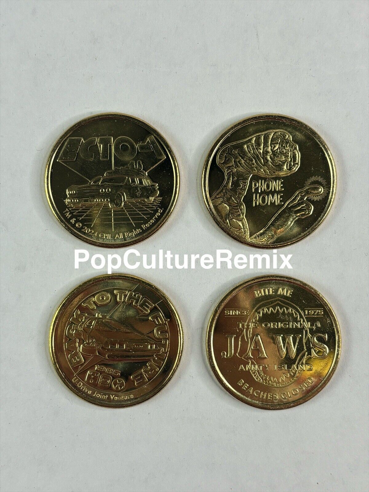 2024 Universal Studios Tribute Store Gold Coin Set Jaws Ghostbusters ET
