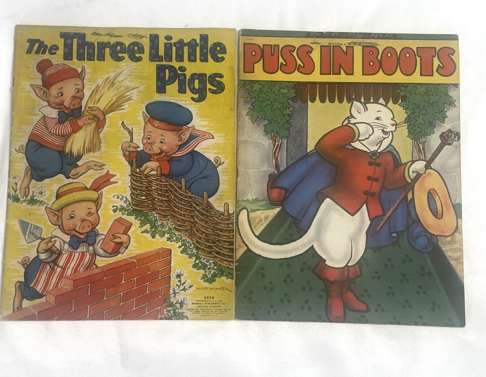LOT OF 2 BOOKS THE THREE LITTLE PIGS 1939 AND PUSS IN BOOTS 1941 CHILDREN'S BOOK