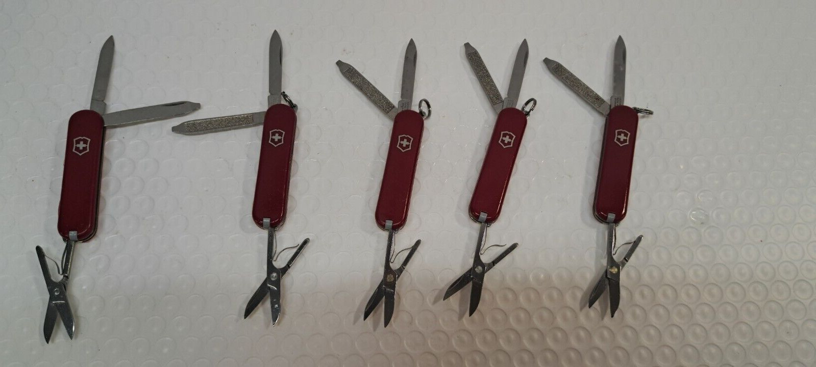 Lot of 5 Victorinox Classic Swiss Army Knives - Red actual lot pictured