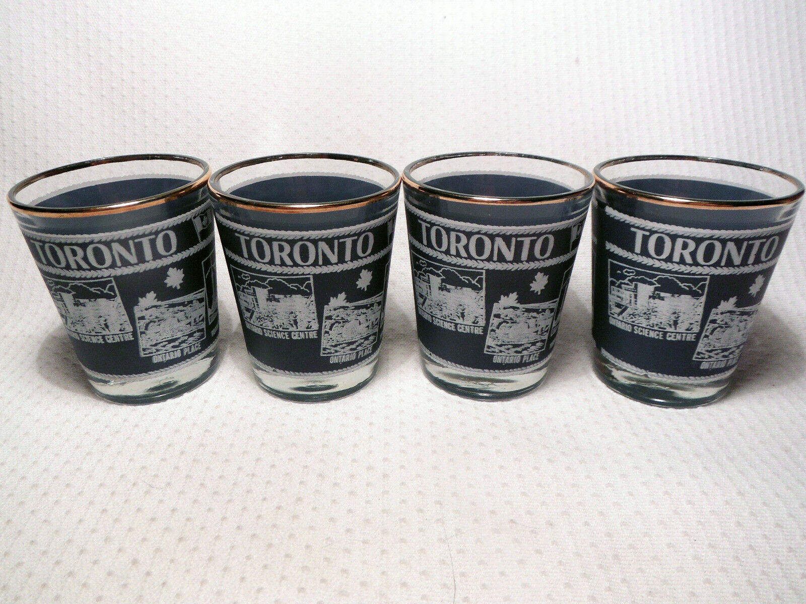 CANADA SHOT GLASSES ~ 4 VINTAGE GLASSES BY DOMINION GLASS.