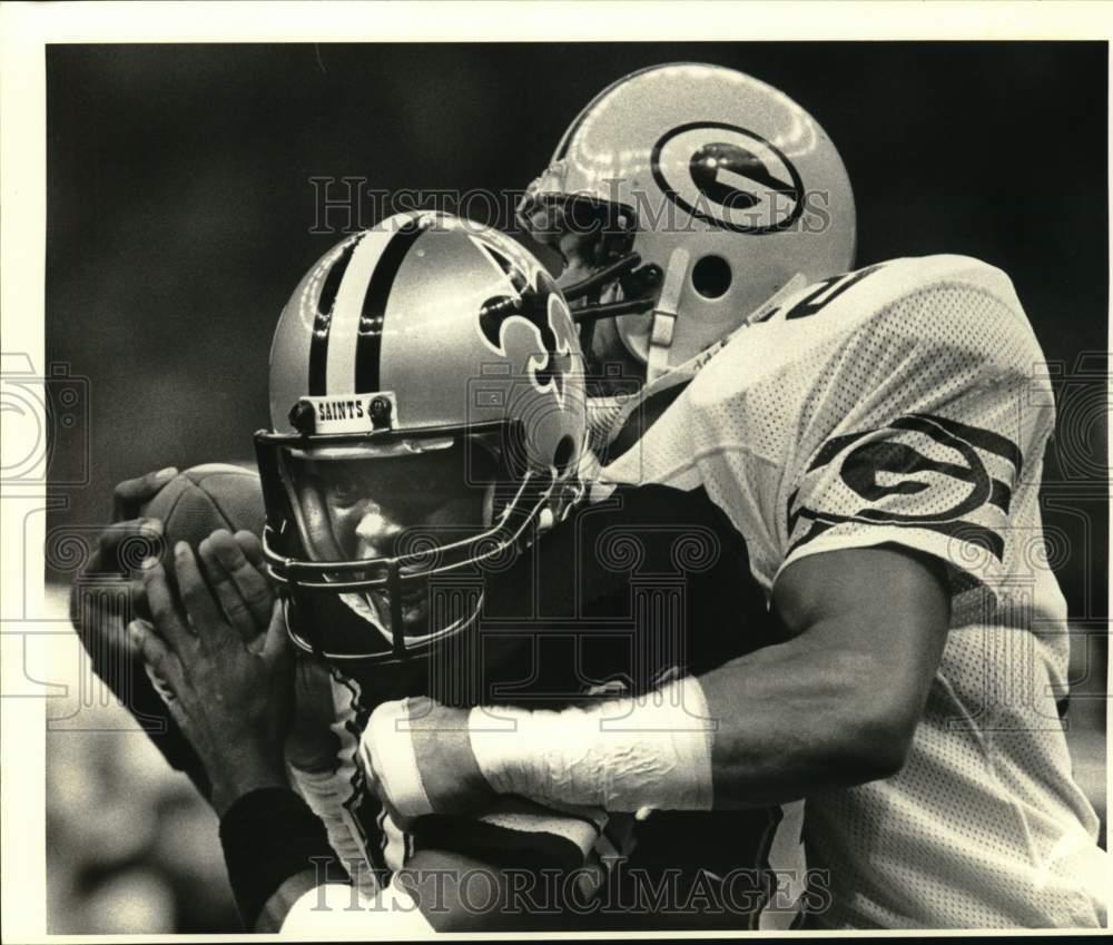 1984 Press Photo Mark Lee, Lindsay Scott in Saints vs. Packers Football Game