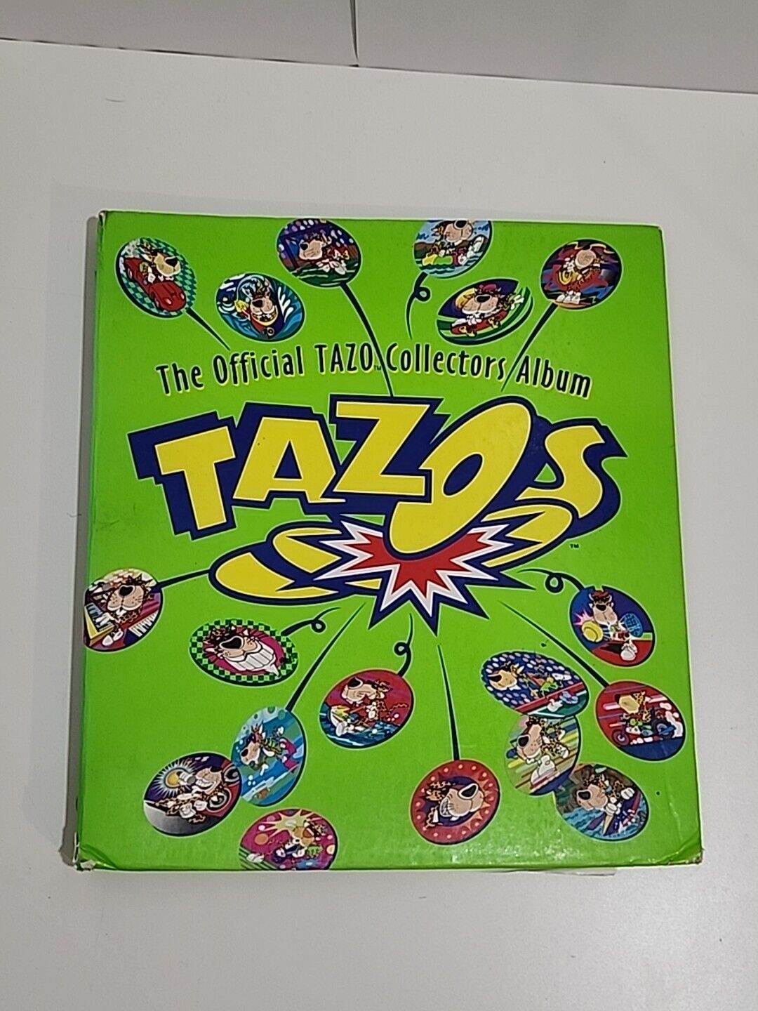 Vintage Official Tazo Collection Album with 53/60 Tazo\'s included