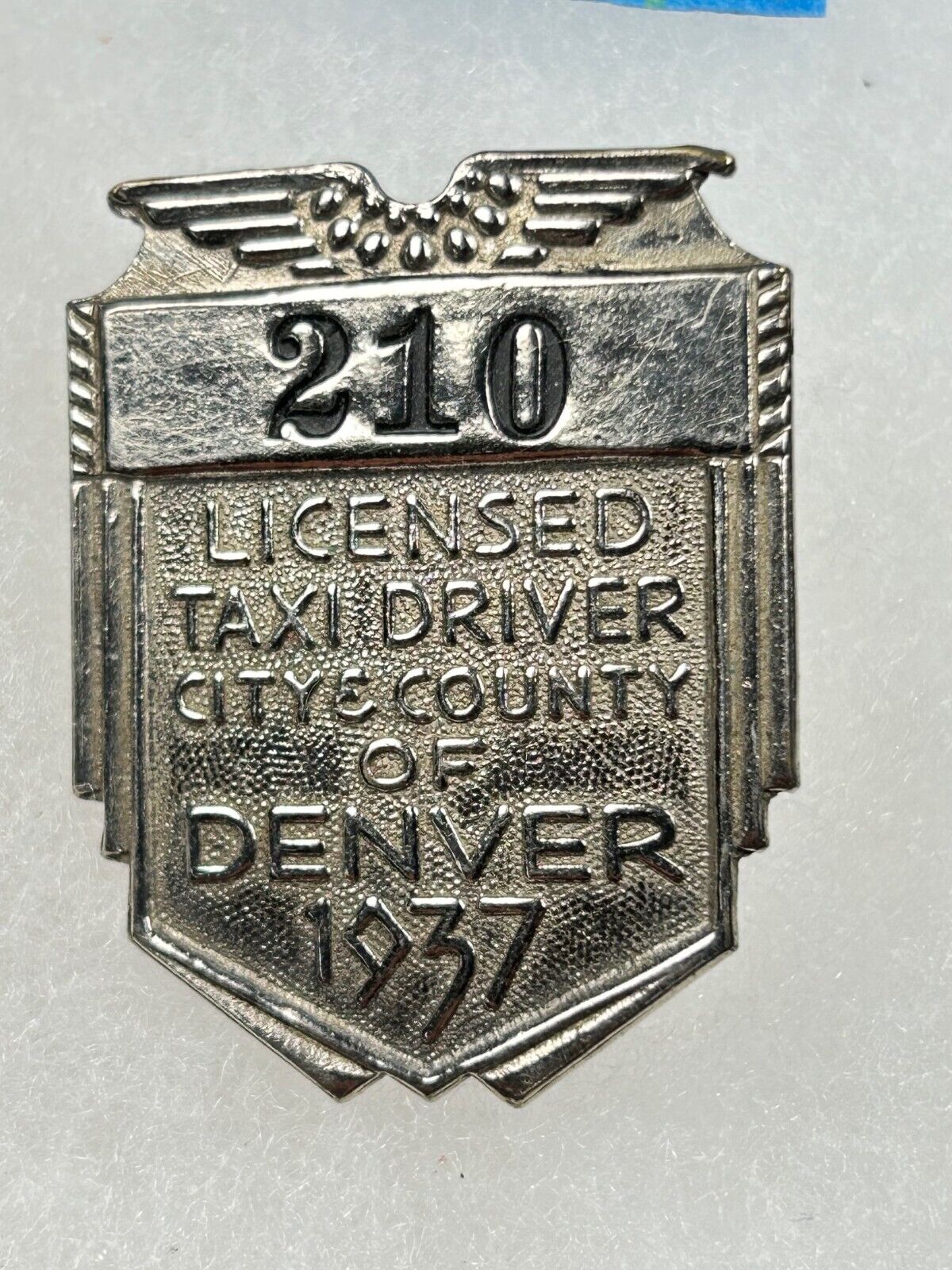 1937 DENVER LICENSED TAXI DRIVER BADGE #210