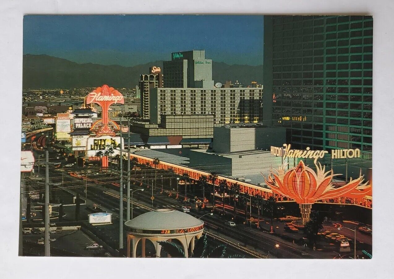 Postcard Exciting Las Vegas Nevada USA Looking Northeast Strip Aerial Night View
