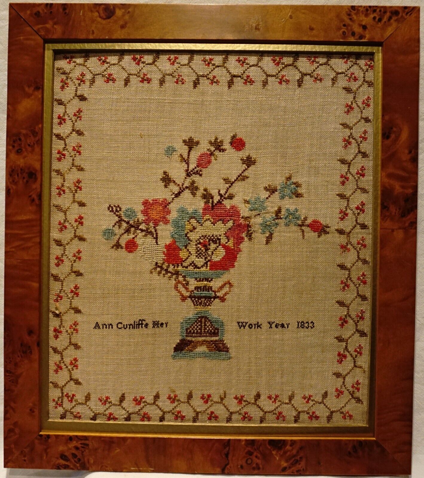 EARLY 19TH CENTURY FLORAL URN SAMPLER BY ANN CUNLIFFE - 1833