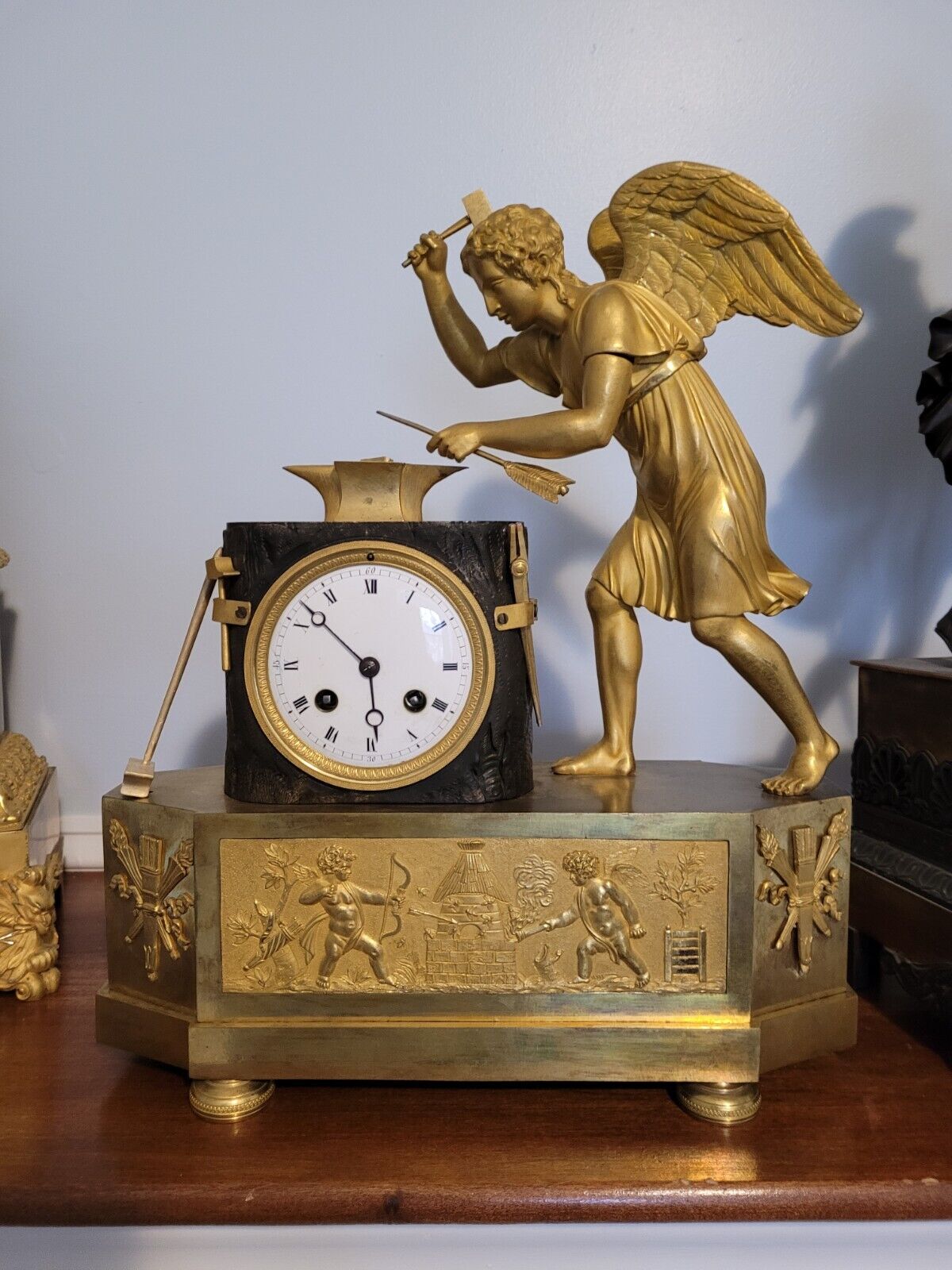 French Gilt Bronze Empire Clock Eros Anvil Arrow Ormolu Cupid Patinated Mantel