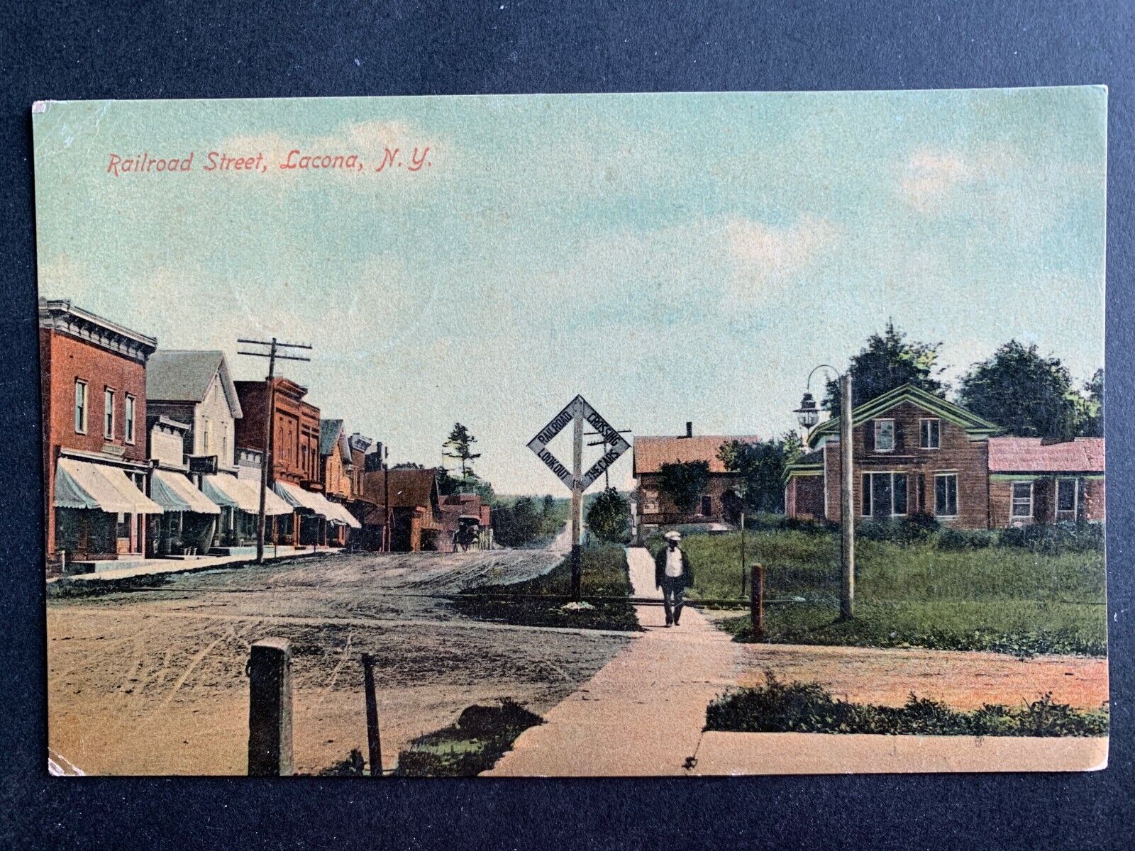 Postcard Lacona NY - c1910s Railroad Street - Lookout Railroad Crossing Sign