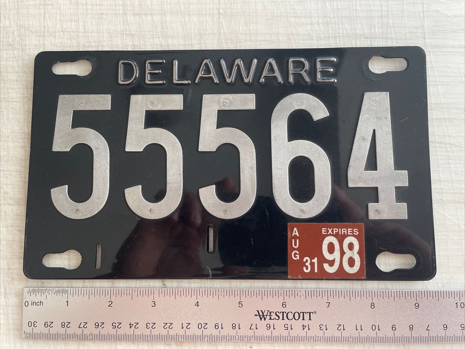 Vintage 1998 Delaware Black Enamel License Plate Tag 55564 (Riveted Numbers)