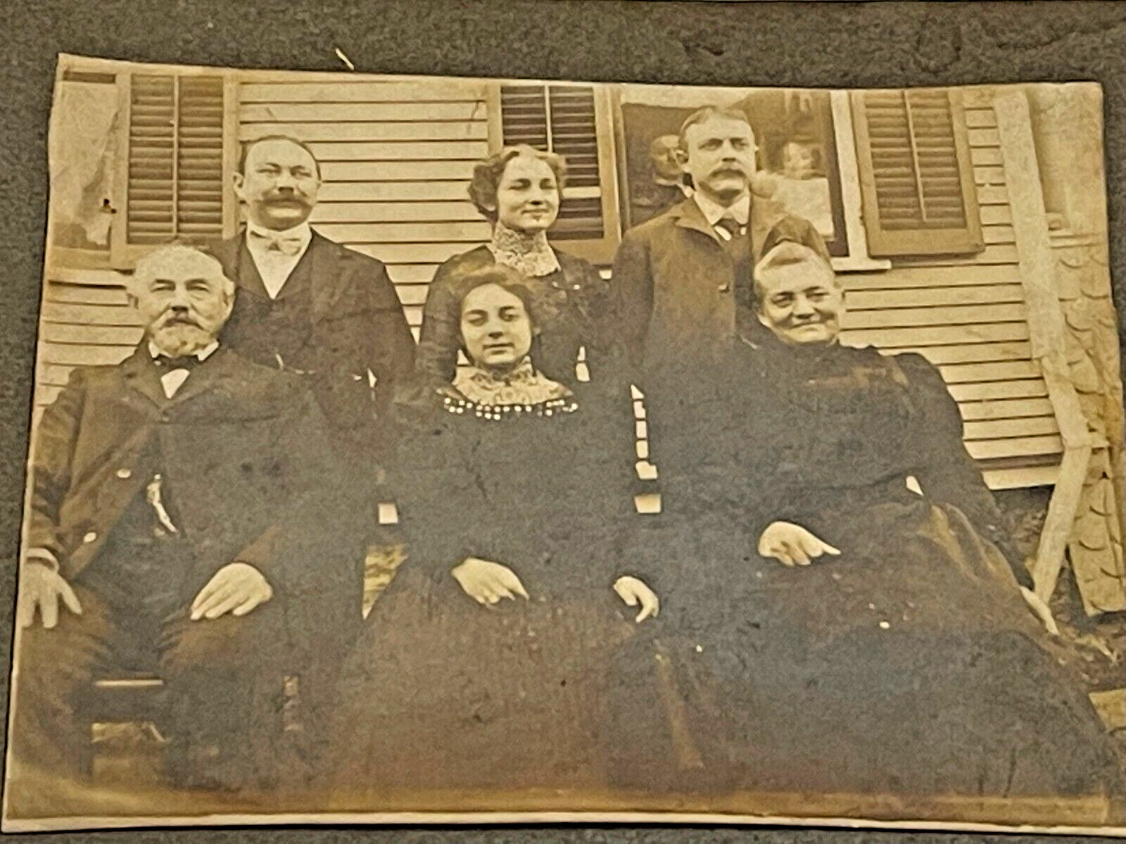 Antique Family Photo Of Men & Women - Baby In The Window