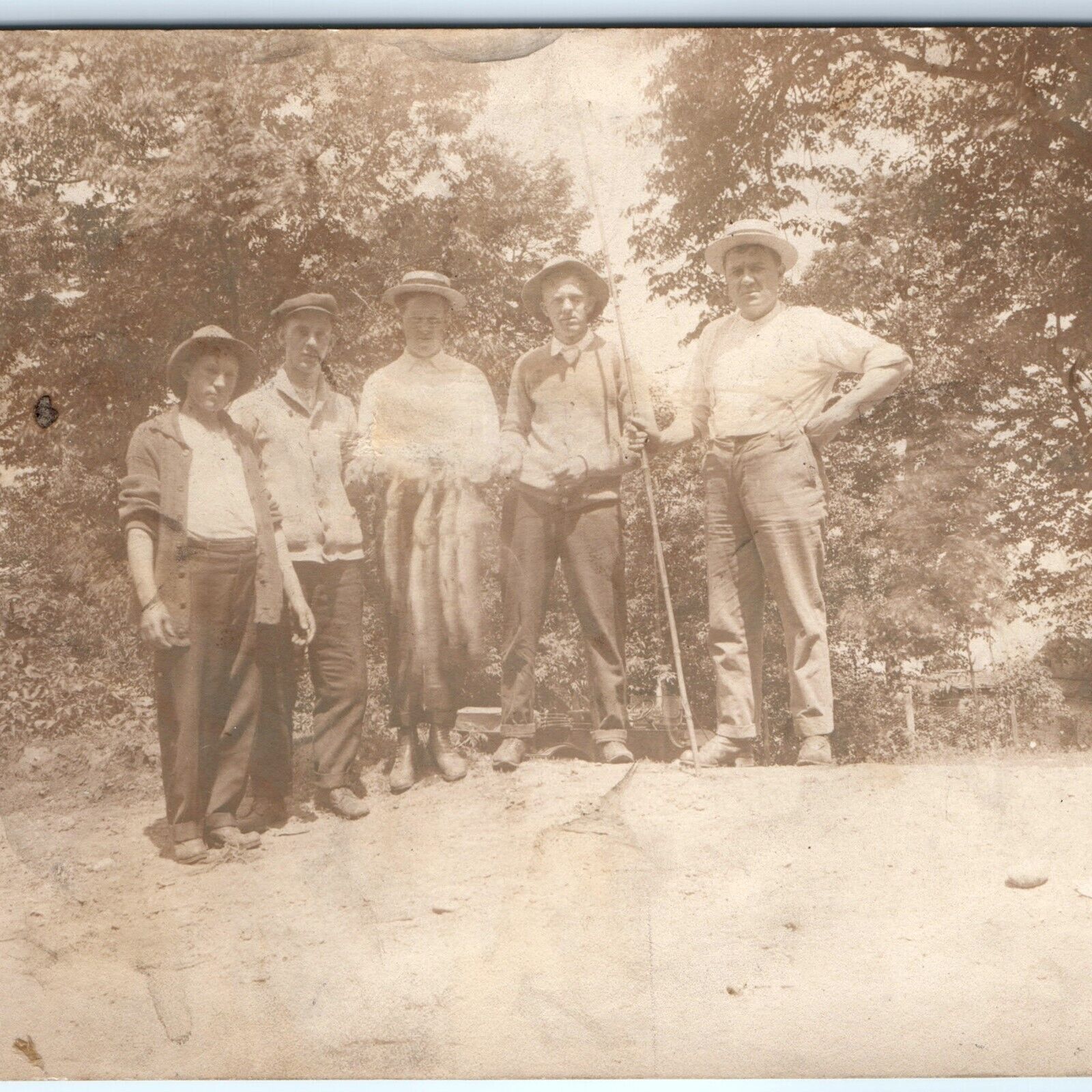 c1910s Men w/ Fish Catch RPPC Fishing Northern Pike? Real Photo PC Bamboo A126
