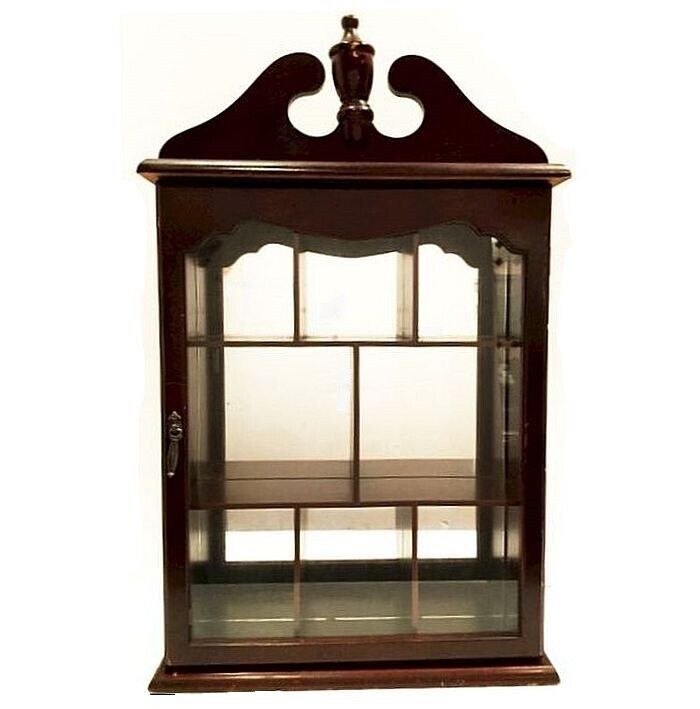 Vintage curio cabinet.  Colonial.  Mahogany stained, glass door.  Mirror backed.