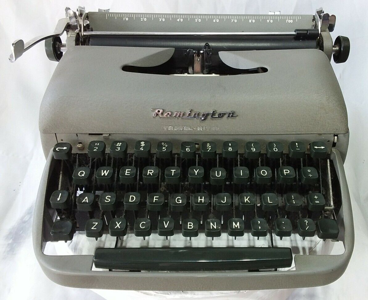 Vintage Remington Portable Travel Riter Typewriter made in Holland 