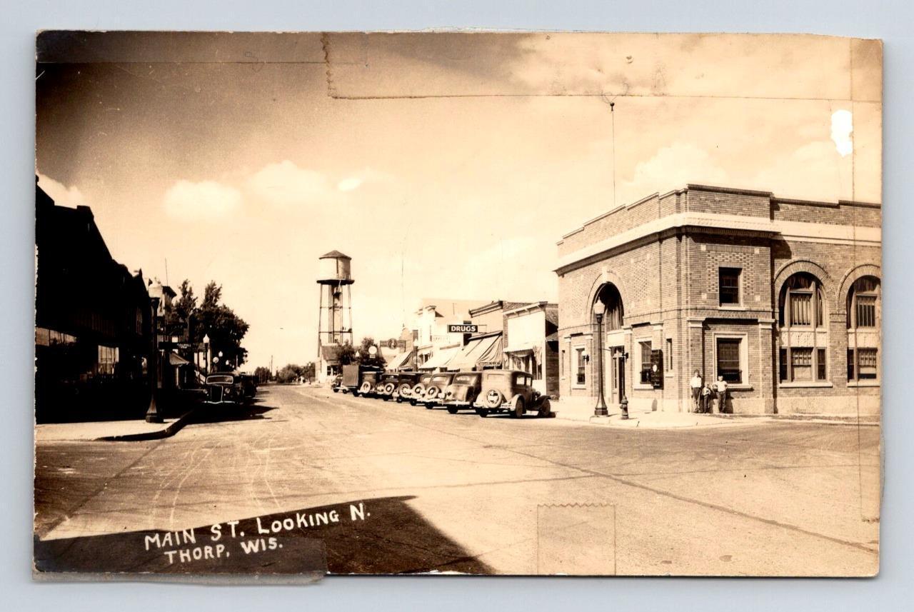 WI - THORP WISCONSIN RPPC Postcard MAIN STREET BAKERY DRUG STORE WATER TOWER