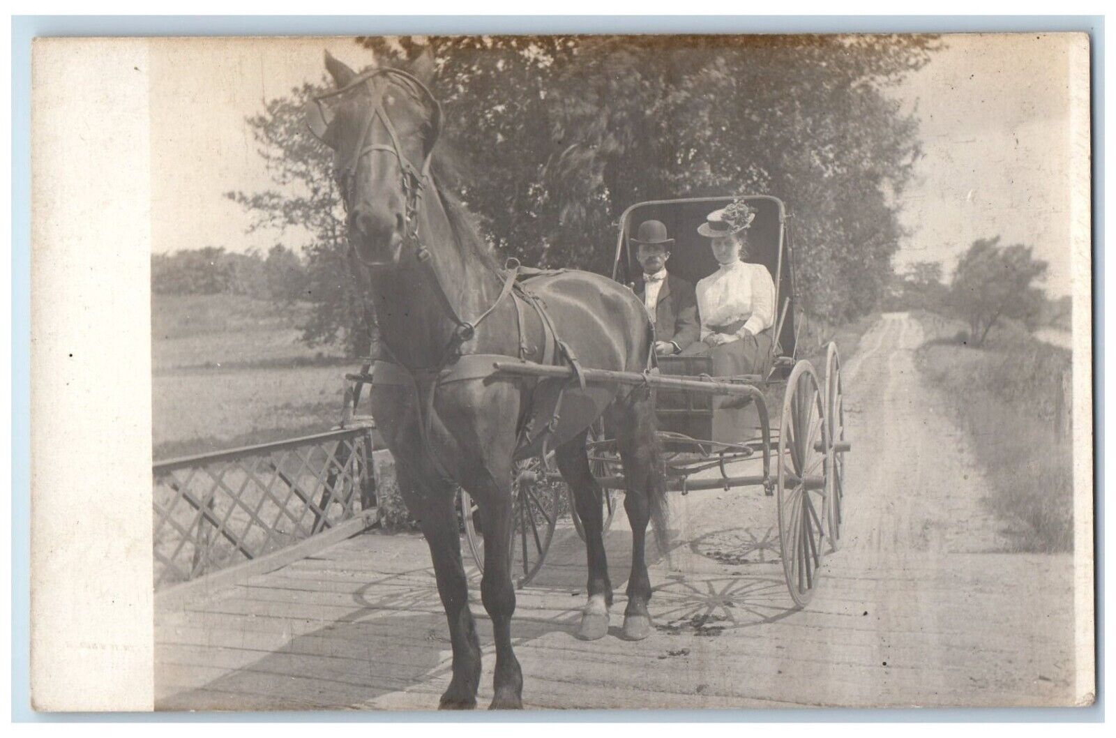 c1910\'s Well Dressed Man Woman Horse Wagon Bridge RPPC Carriage Photo Postcard