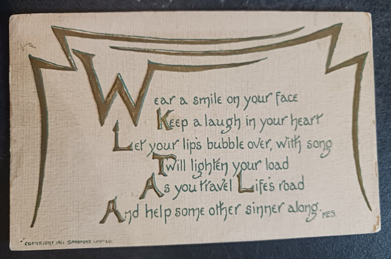 1913 postcard Embossed Sandford Poem Motto Wear A Smile On Your Face posted