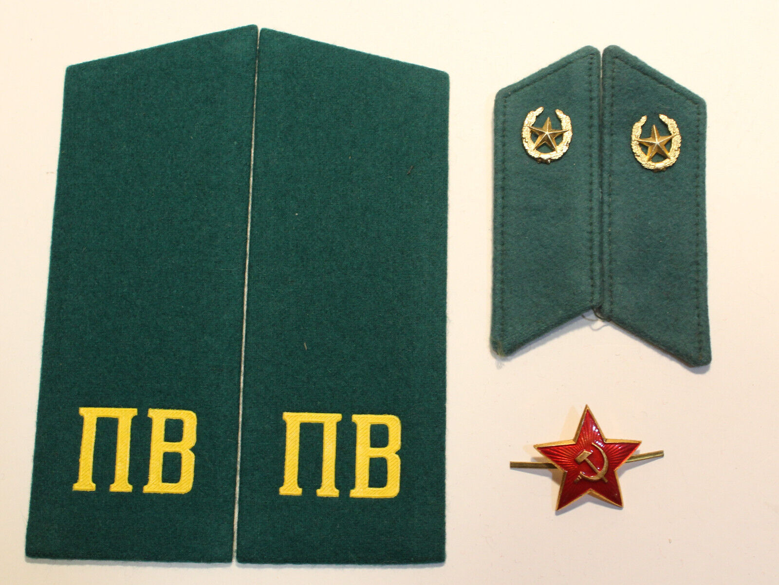 Soviet Russian Cold War Border Guard insignia: collar tabs, epaulets, hat star
