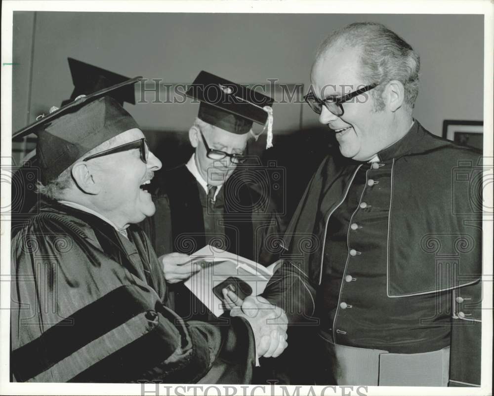 1977 Press Photo Dr. Francis Phillips and Reverend Francis Murphy smiling.
