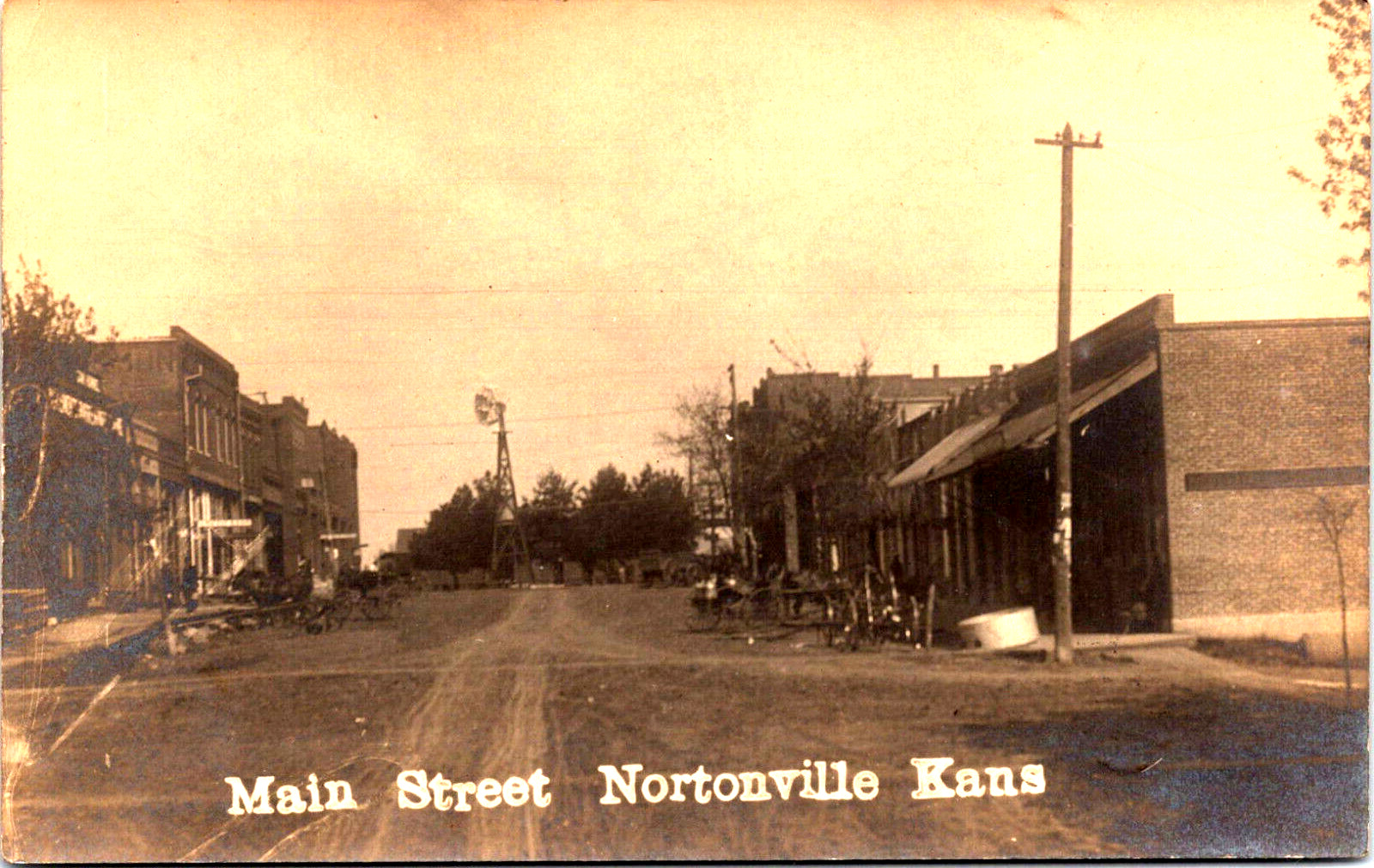 Antique RPPC Real  Photo Postcard 1909 Nortonville, Kansas Main Street Windmill