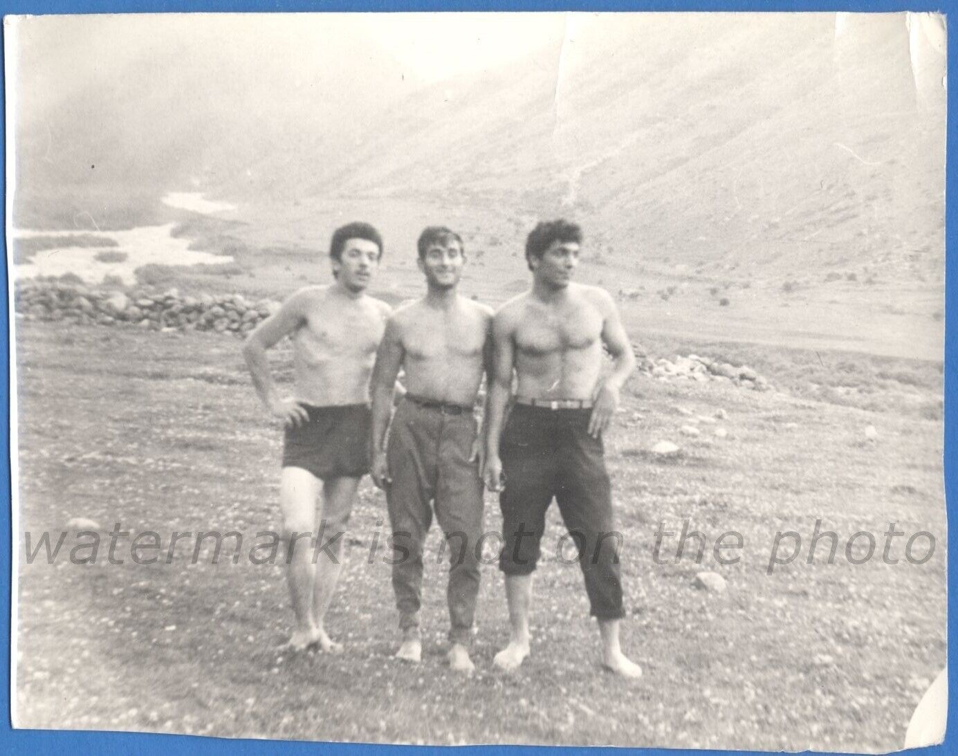 Three handsome guys without shirts Vintage photo