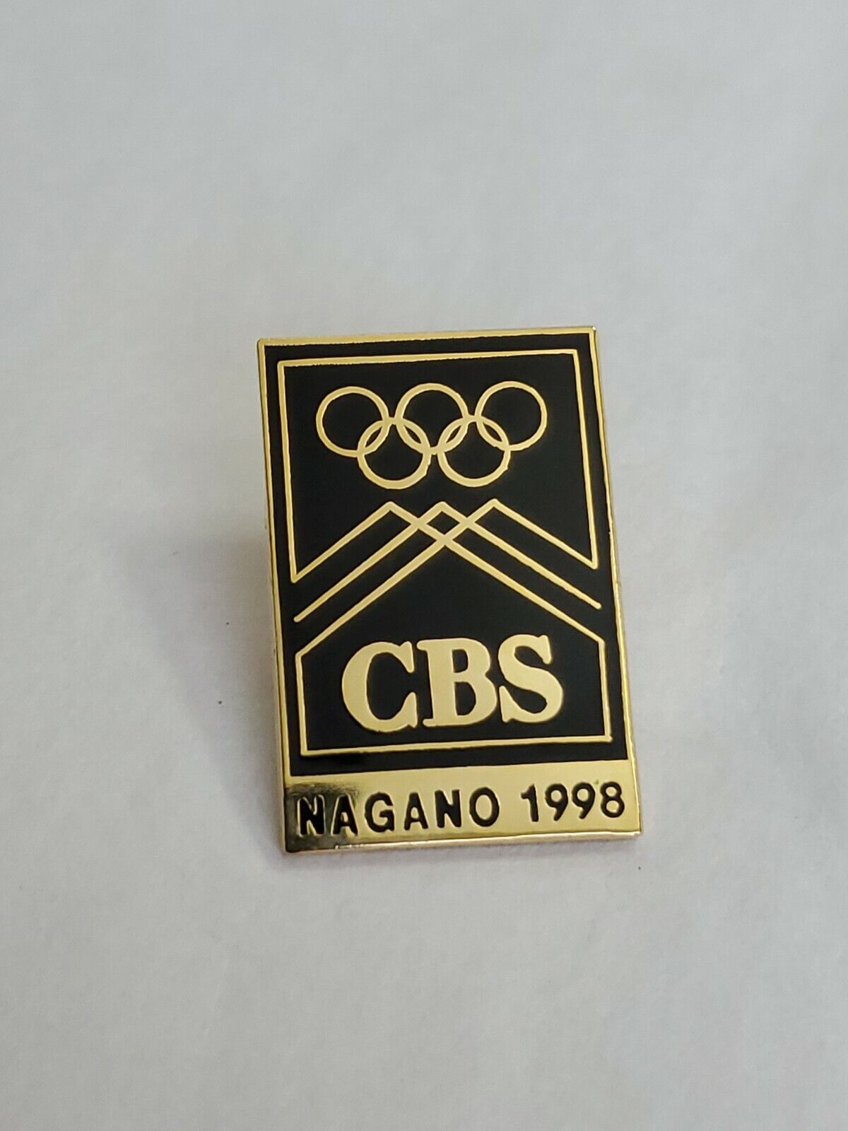 CBS Nagano 1998 Winter Olympic Games Souvenir Pin Black And Gold Colored