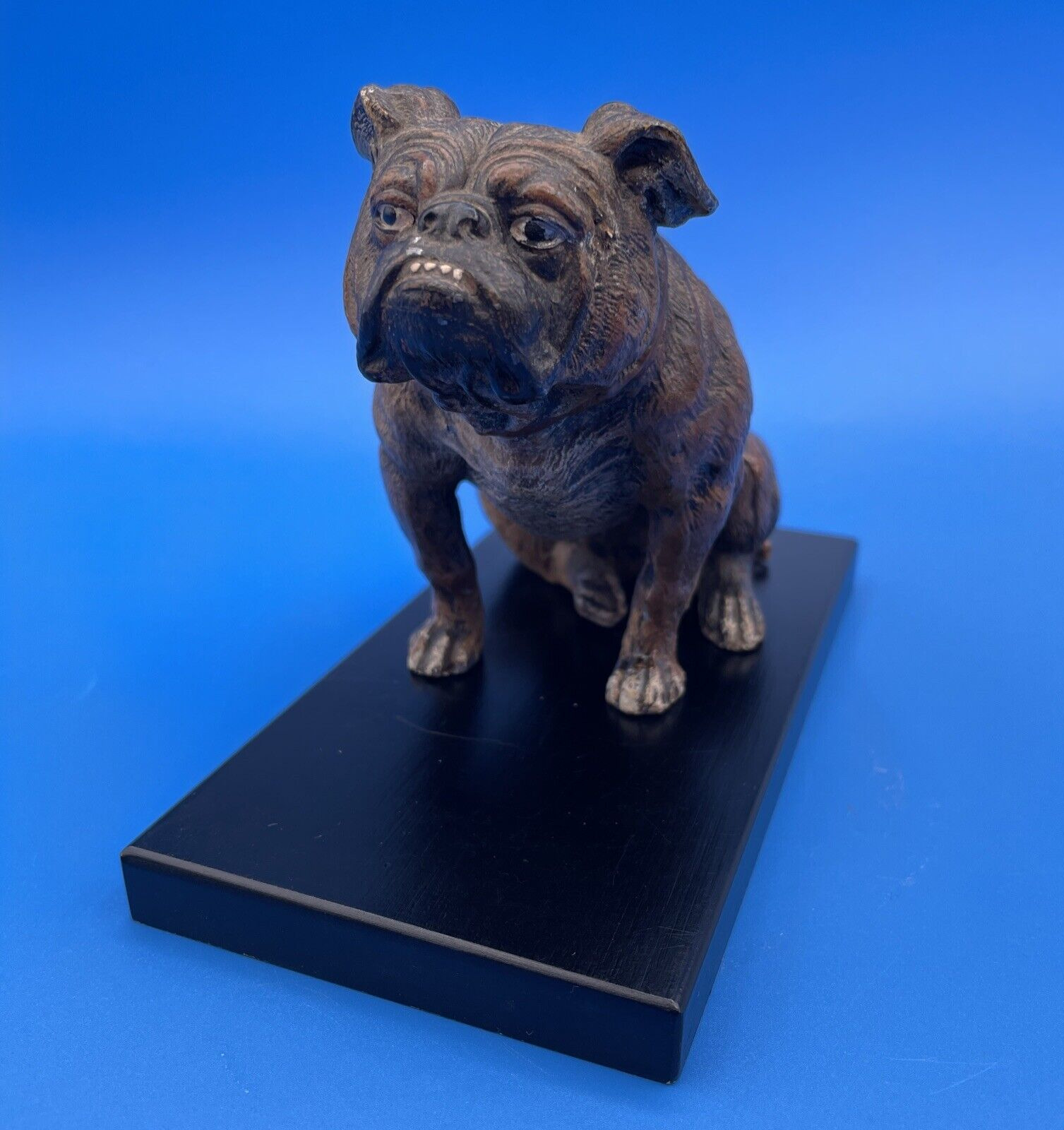VINTAGE HAND DECORATED SPELTER FIGURINE OF A SEATED BULLDOG ON A PLINTH