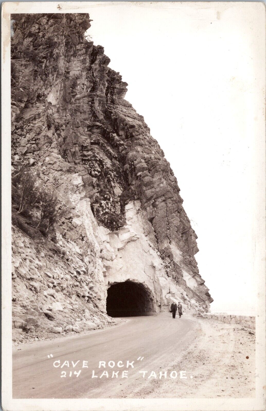 RPPC Elderly Couple pose at Cave Rock Tunnel, Lake Tahoe Nevada- 1940s Postcard