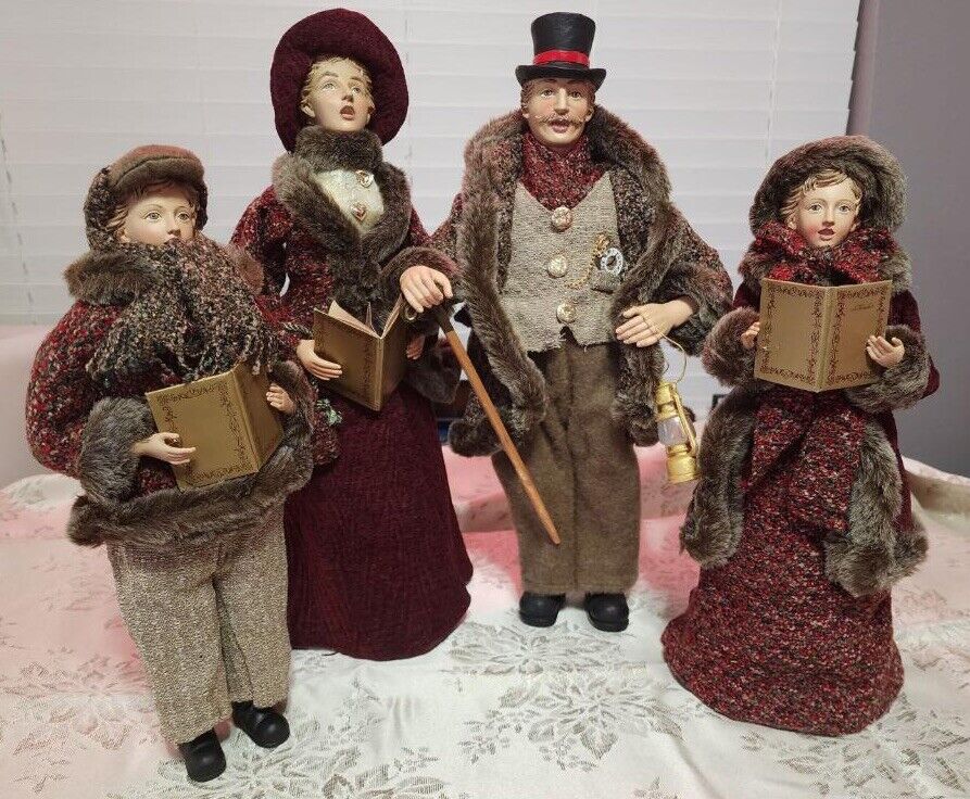 Carolers figurines 4 Christmas real clothing  resin. The tallest 20” & 16” Rare