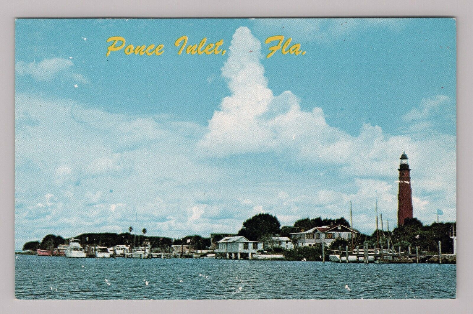 Postcard FL Old Lighthouse Boats Docks Seagulls Water View Ponce Inlet Florida