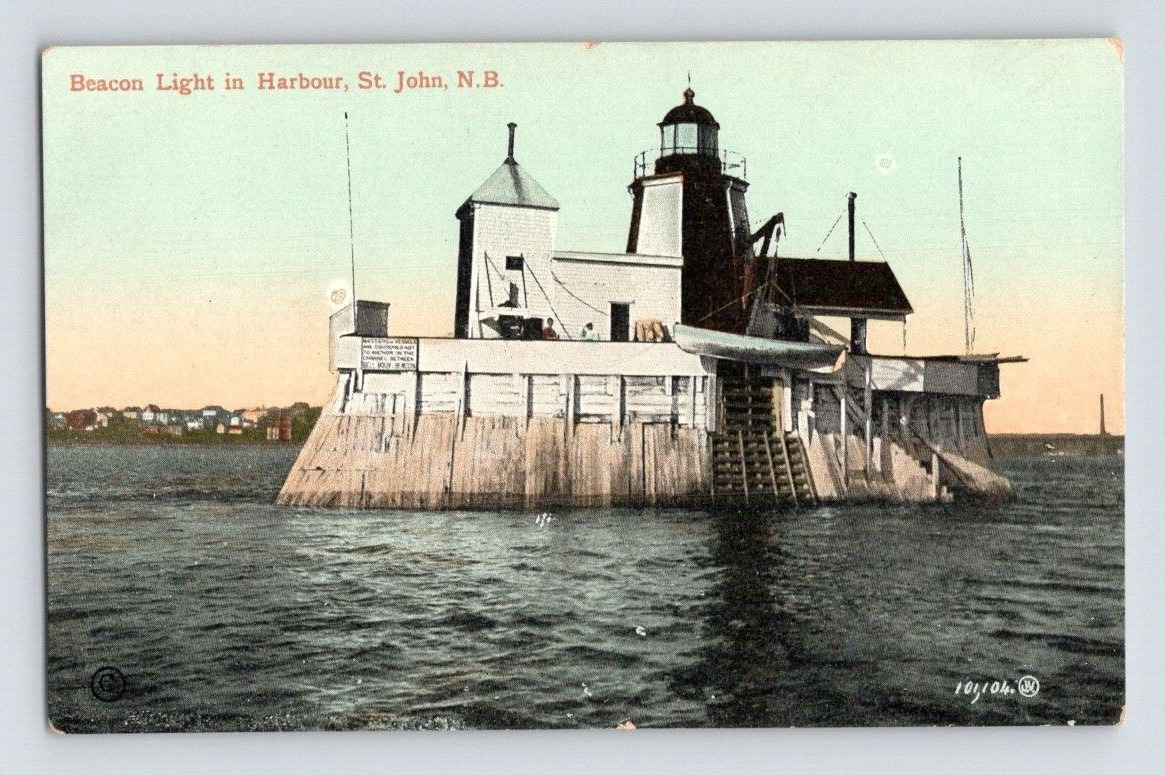 1910. ST. JOHN N.B. BEACON LIGHTHOUSE IN HARBOR. POSTCARD CK29