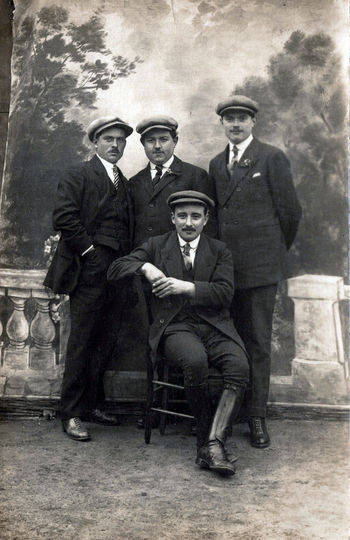 Four Young Men With Caps Real Photo Postcard rppc