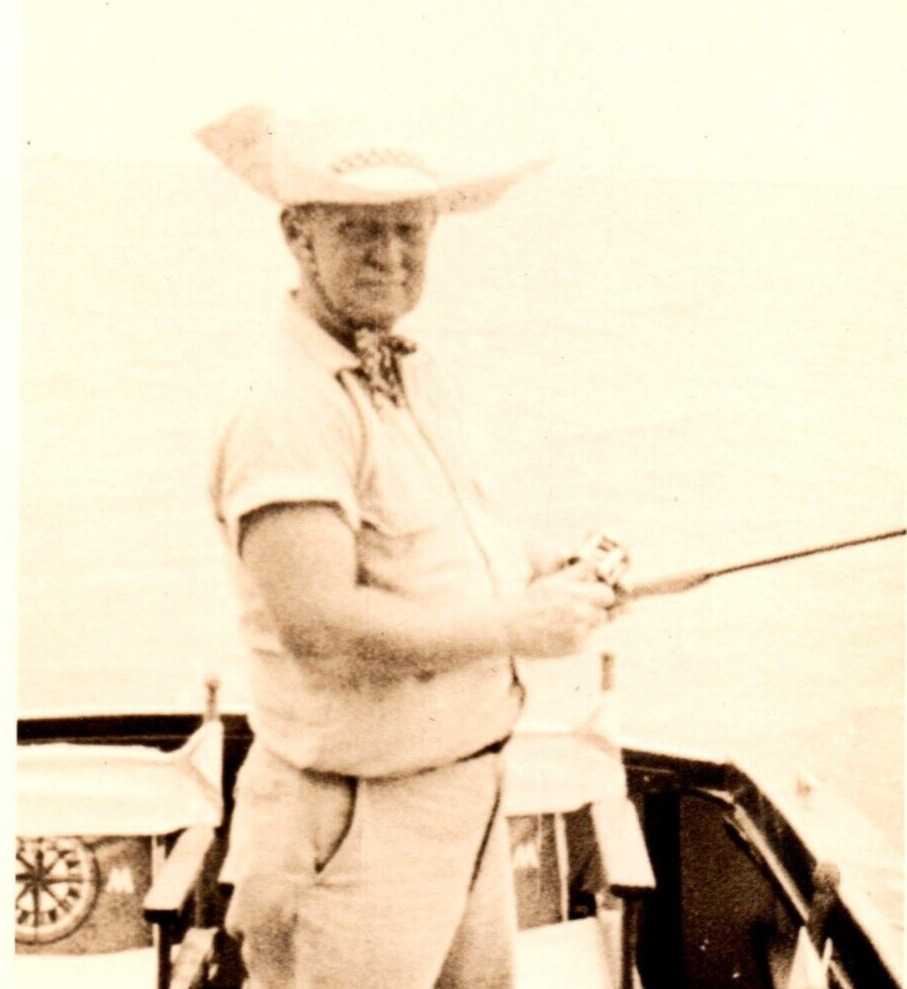 Man Fishing From Boat Photograph Vintage Photo