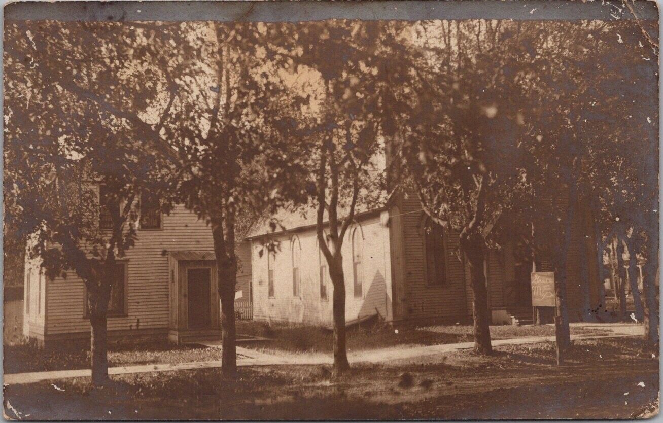 1908 MOORHEAD, Minnesota RPPC Real Photo Postcard GRACE M.E. CHURCH Street View