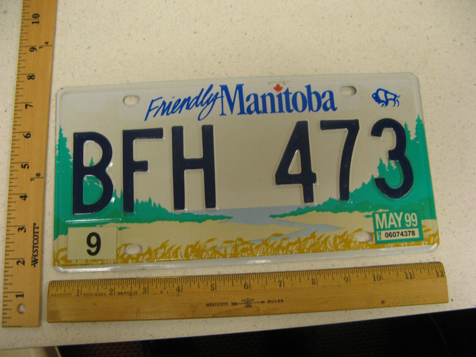 1999 99 MANITOBA CANADA LICENSE PLATE #BFH 473 NATURAL STICKER