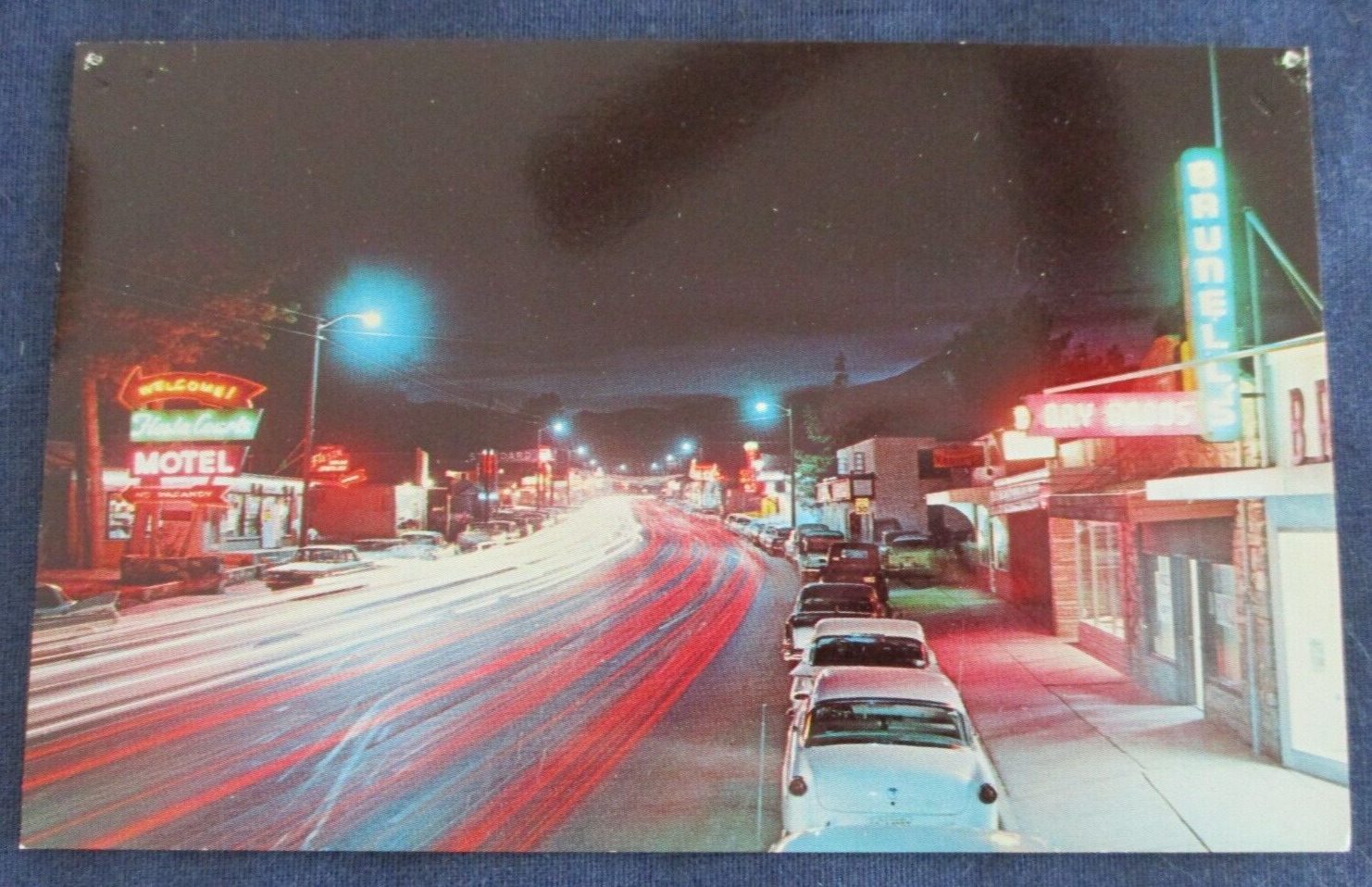 1960s Ruidoso New Mexico Street Scene at Night Neon Signs Postcard