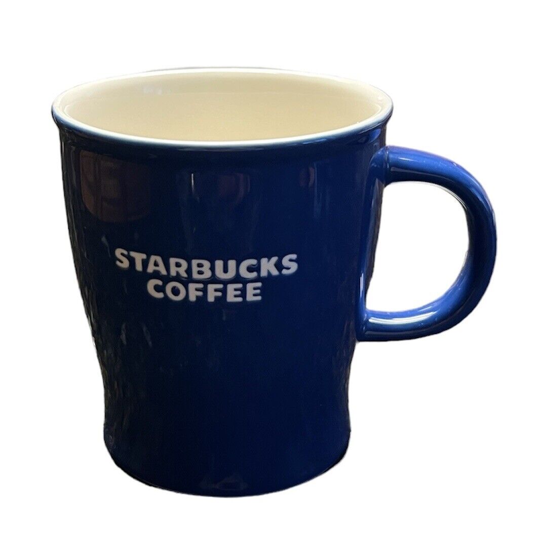 Starbucks Coffee Cup Mug 2009 Bone China Blue White Embossed Lettering 16 oz