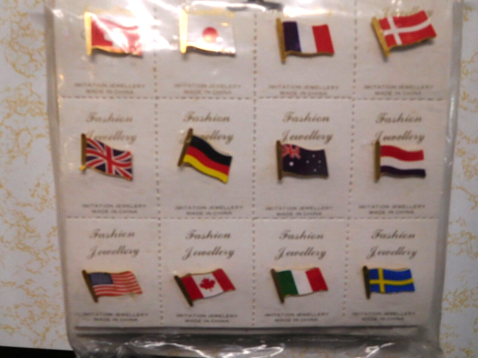 144 Flag Pins of 12 Different Contries USA, UK, France, Germany, Japan, Canada