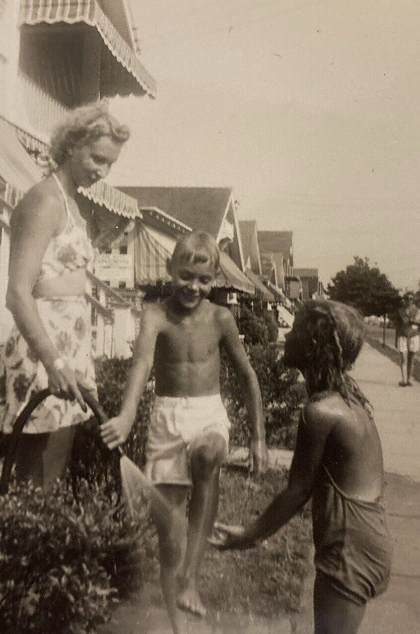 1950s black & White mom w/ Kids & Garden Hose photo FOUND PHOTOGRAPH Original