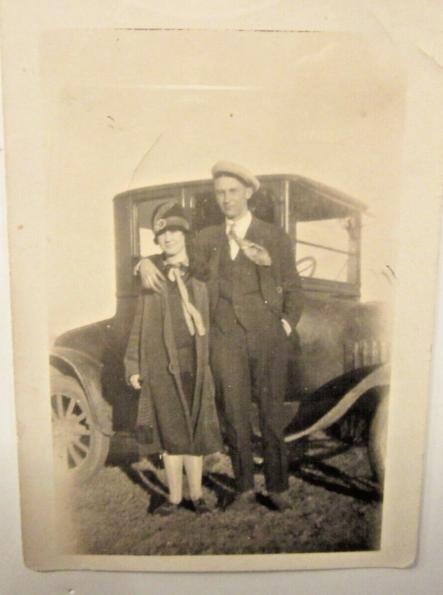 1923 ? FORD MODEL T COUPE and a young couple in NE, b&w photo, 3 1/2\